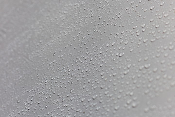 Closeup to dew on the camping tent on the morning