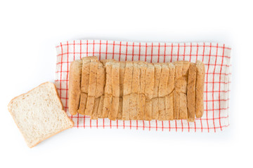Fresh bread sliced on towel., white background..Whole wheat and organic ingredient bread,healthy eating concept.