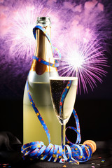 Bottle Of Champagne With Fireworks In The Background