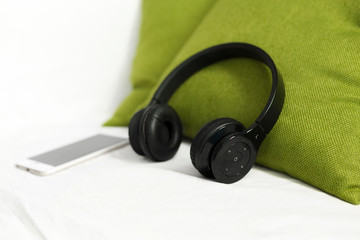 headphone lying on pillow for listening relax music