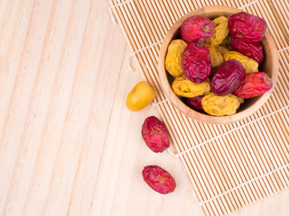 close up shot on dates, sweet dried fruits on wooden background