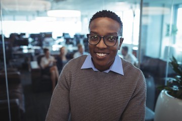 Portrait of smiling businessman wearing eyeglasses