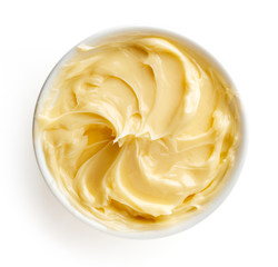Bowl of butter on white background