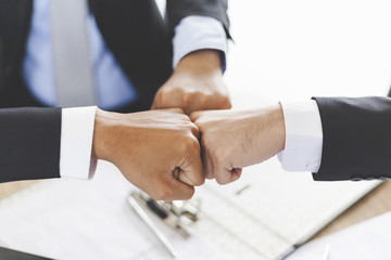 Fist Bump - Business partners,friendship and togetherness Collaboration Concept. group of...