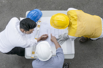 Top View Business People,engineer and Architects discussion and working with partner and...