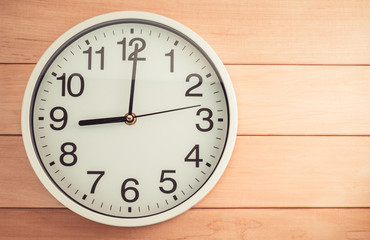 wall clock on wood