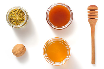 jar of honey on white background