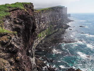 cliffs in Iceland with rugged coastline