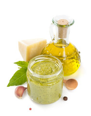 pesto sauce in jar on white background