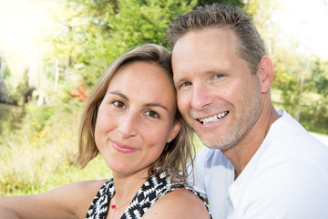 Couple in love enjoying tender moments during sunset