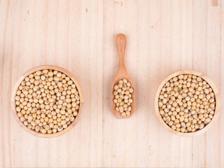 created shot of beans on wooden bowl in studio