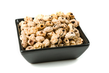 Organic tiger nuts isolated on a white background