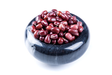 Red adzuki beans isolated on a white background
