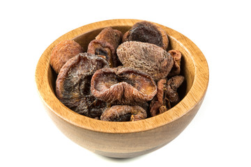 Organic dried apricots isolated on a white background