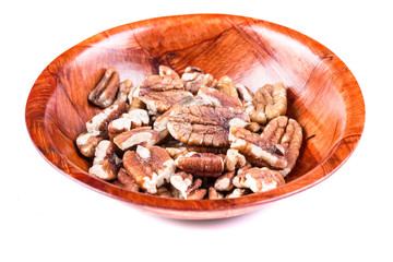 Organic shelled pecans isolated on a white background