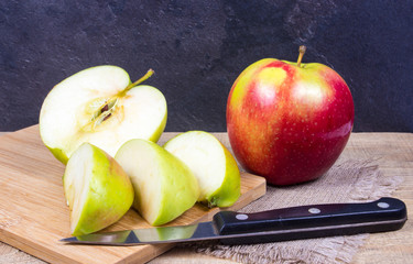 Fresh apple on a wooden background.