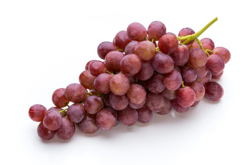 Ripe red grape isolated on white.
