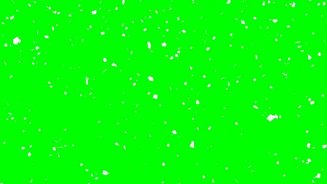 Animated simple snow flakes falling against green background.