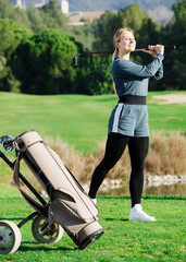 Female golfer at golf course