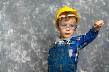 Boy in hard hat with construction line