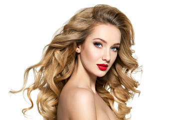 Pretty woman with long  hair and red lips.