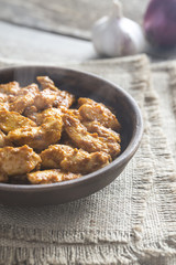 Portion of butter chicken