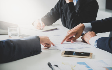 Business team hands at working with financial, working with a lot of numbers.