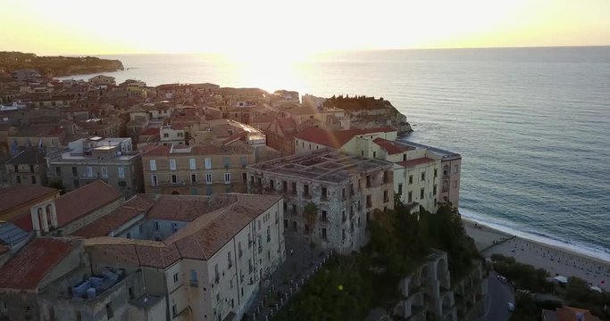Aerial, drone view of the town Tropea in Calabria. Coast at the evening, sunset time.