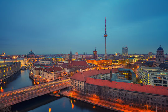 Aerial view of Berlin at night: Spree river, museum island, alexanderplatz and tv tower, Germany