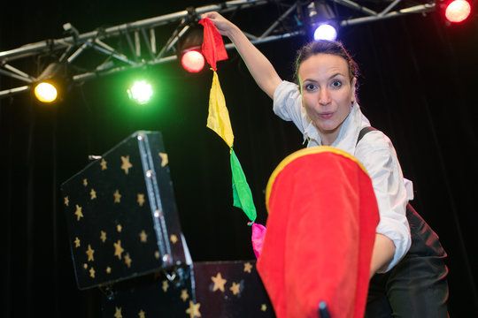 magician woman performing on stage