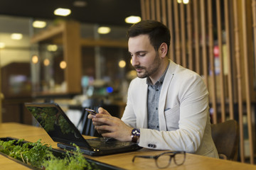 Fototapeta premium Businessman at the coffee shop