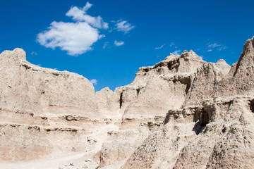 Fototapeta na wymiar Badlands National Park in South Dakota with blue sky