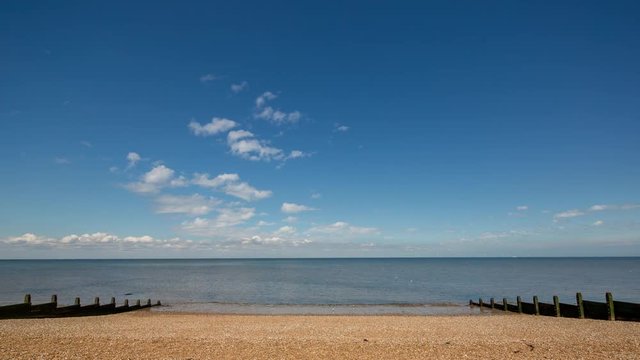 Time lapse of a pebble beach in whistable, kent, england on a summer's day