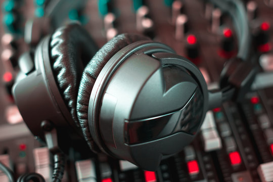 soundmixer and headphones. recording studio.