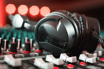 Fototapeta na wymiar soundmixer and headphones. recording studio.