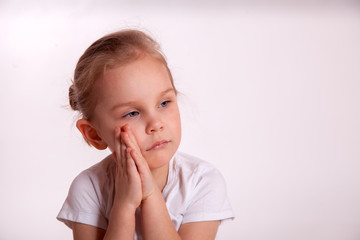 Sad child isolated on white