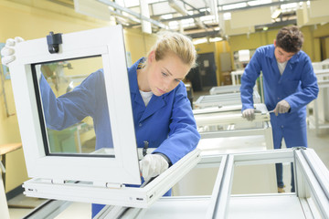 People working in window factory