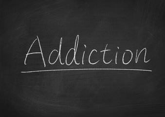 Obraz premium addiction concept word on a blackboard background