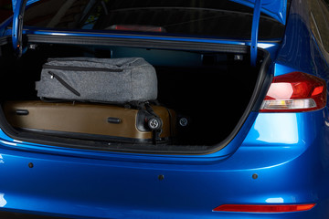 Obraz premium Close-up of car trunk with bags