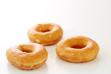 Obraz na płótnie Canvas Glazed donutson a white Background