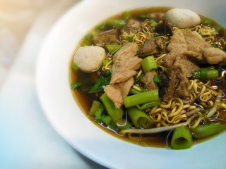 lunch delicious in luxury restaurant with beef noodle soup on dining table