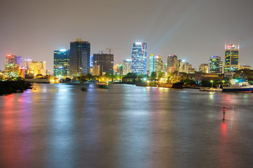 Night view of Business and Administrative Center of Ho Chi Minh city on Saigon riverbank in twilight, Vietnam.
