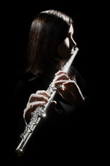 Flute player Flutist playing flute instrument © Alenavlad