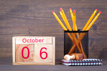 October 6. close-up wooden calendar. Time planning and business background.
