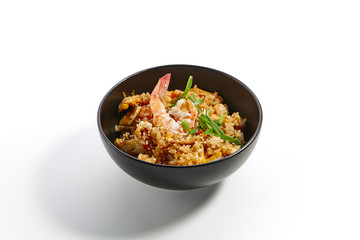 Special dishes of Pan-Asian cuisine in dark iron plate