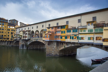 Fototapeta na wymiar The Ponte Vecchio bridge over the River Arno in Florence 