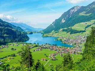 Beautiful lake Lungern and village from Brunig Pass, Switzerland.