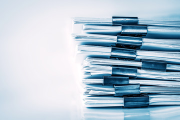 extreamly close up  the stacking of office working document with paper clip folder - 175022730