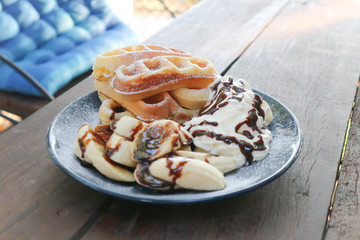 waffle with banana and whipped cream