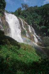 Wachirathan Waterfall With a Rainbow on a Sunny Day, Doi Inthanon National Park, Thailand